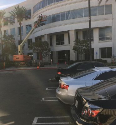 Office building painted with fresh, professional exterior paint. Skilled painters ensure a clean, du.