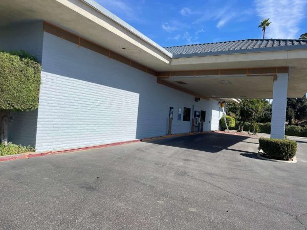 Commercial building exterior painted by professional painters.